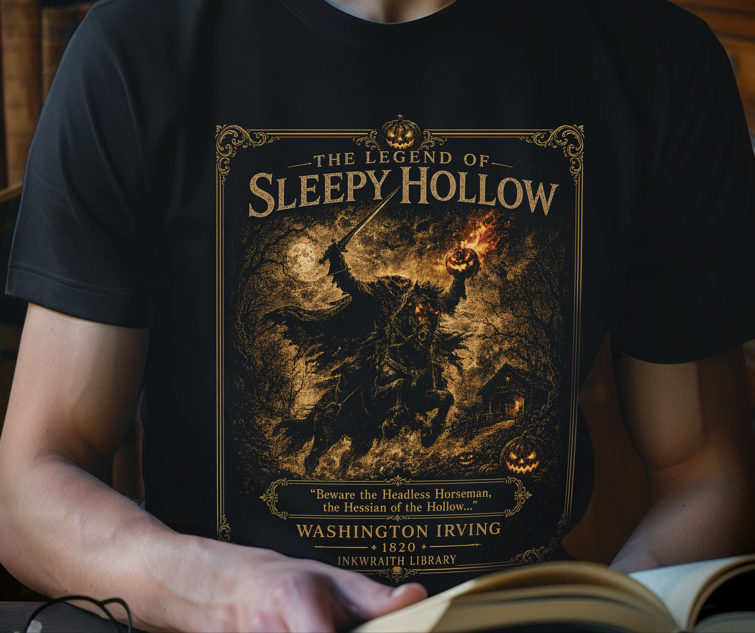 Person wearing a black t-shirt with 'The Legend of Sleepy Hollow' design.